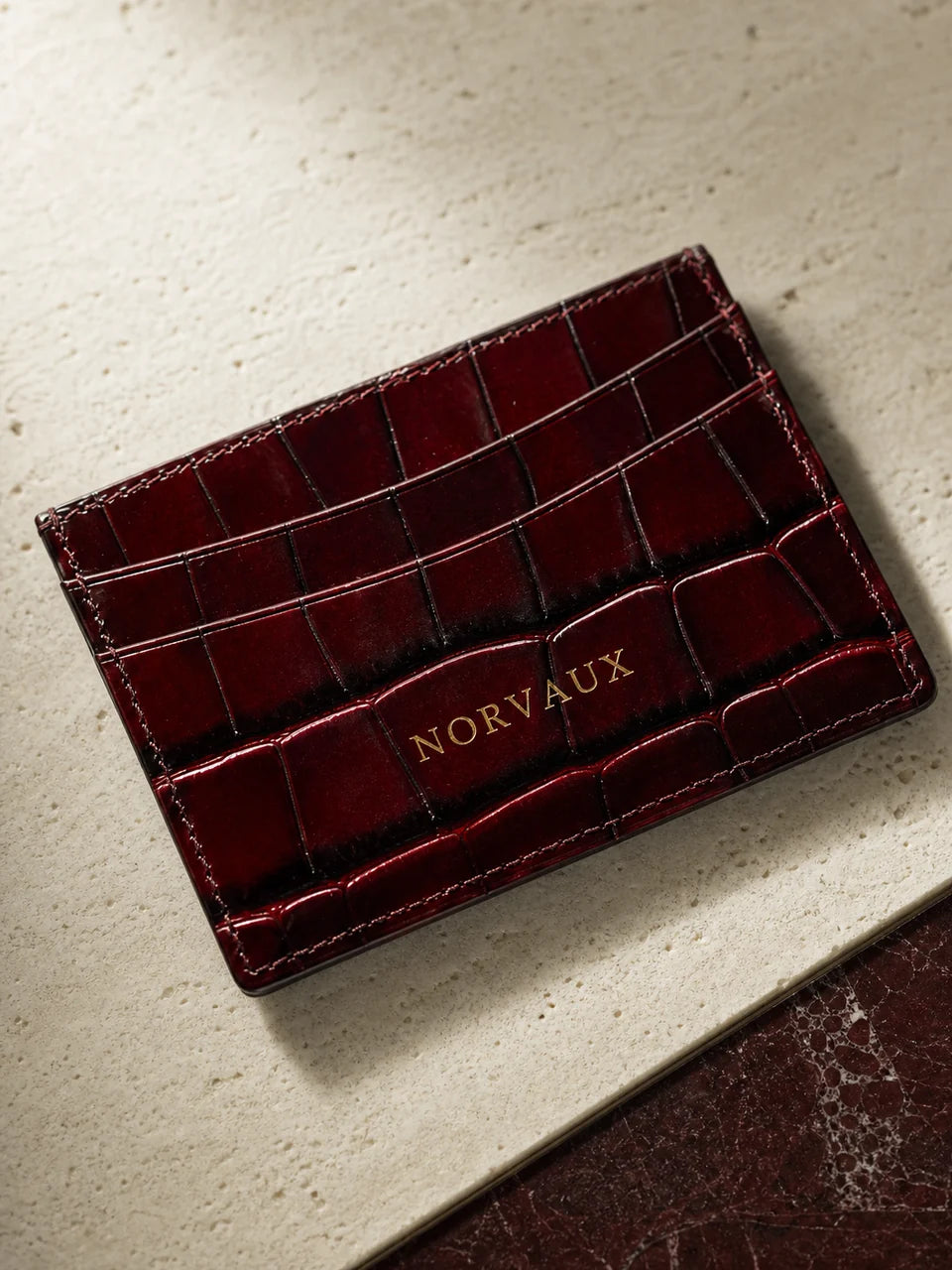 Close view of the crocodile embossing on a CROVÉ cardholder