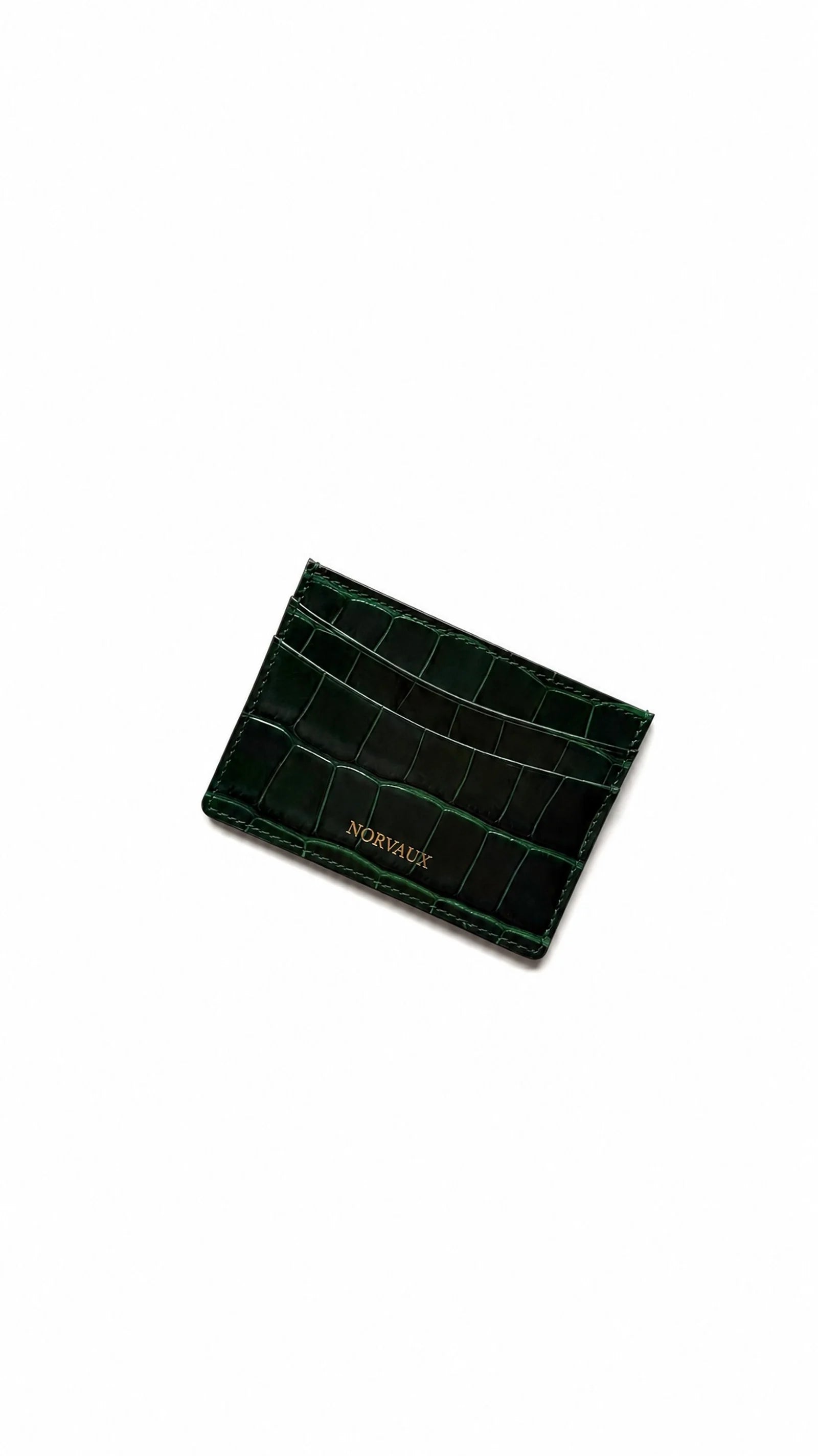 CROVÉ Emerald detail of the crocodile embossing