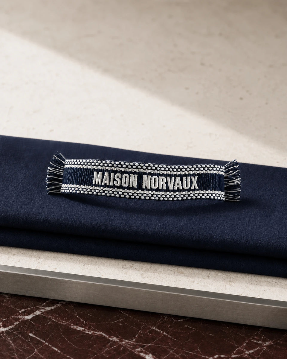 Navy Maison Band woven bracelet with white MAISON NORVAUX lettering