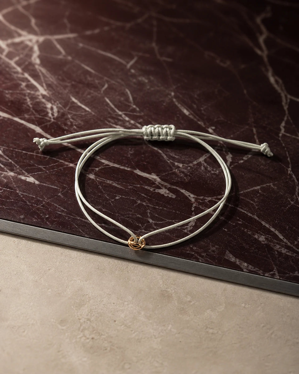 ORÉA Grey pale-grey cord bracelet with a polished gold-tone bead